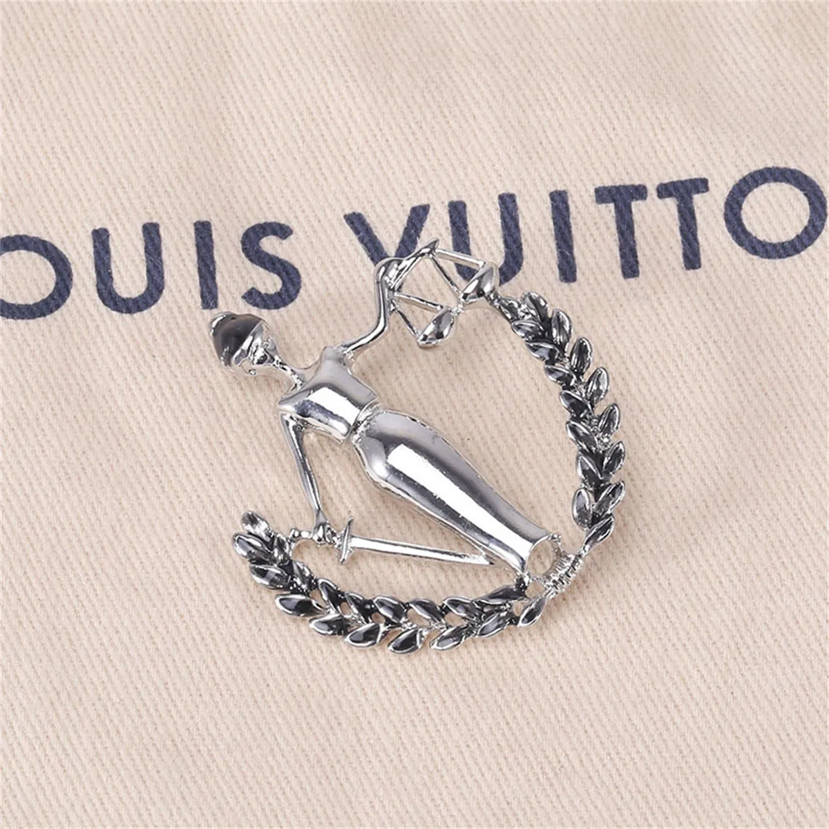 Black Enamel & Silver-Plated Libra Figure Brooch