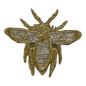 Dior gold metal pins & brooches