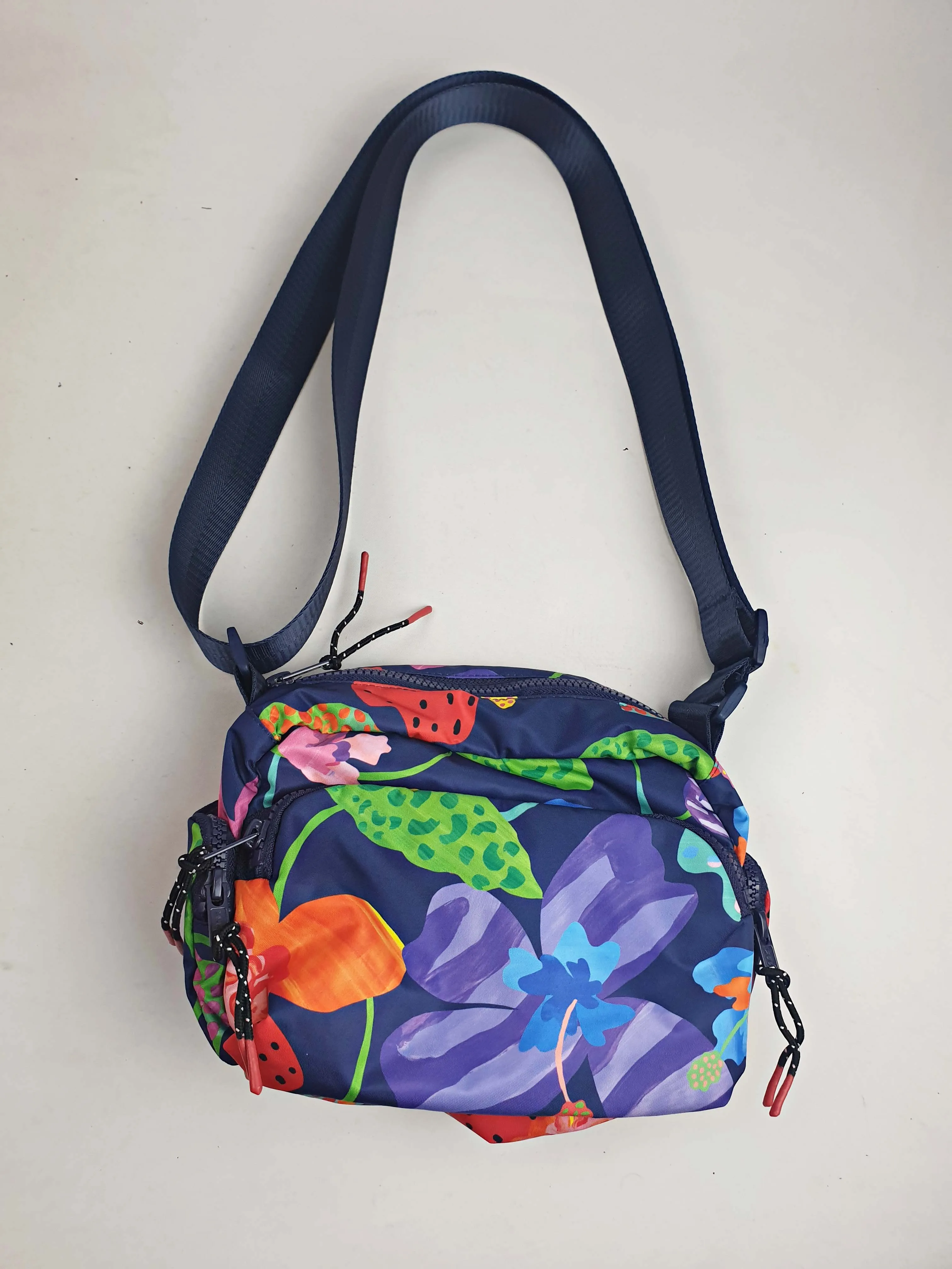 Gorman blue-based floral adjustable small bag