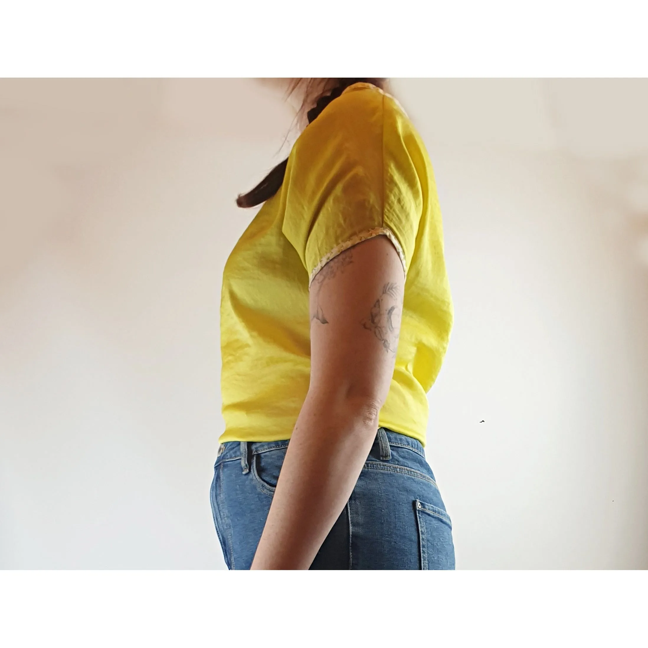 Queen yellow silky feel top with a pretty floral print detail size M (best fits size 12)