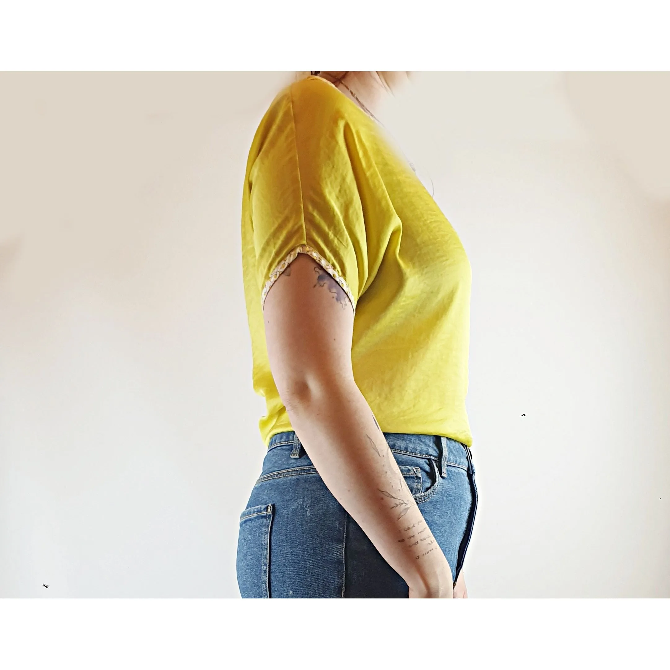 Queen yellow silky feel top with a pretty floral print detail size M (best fits size 12)