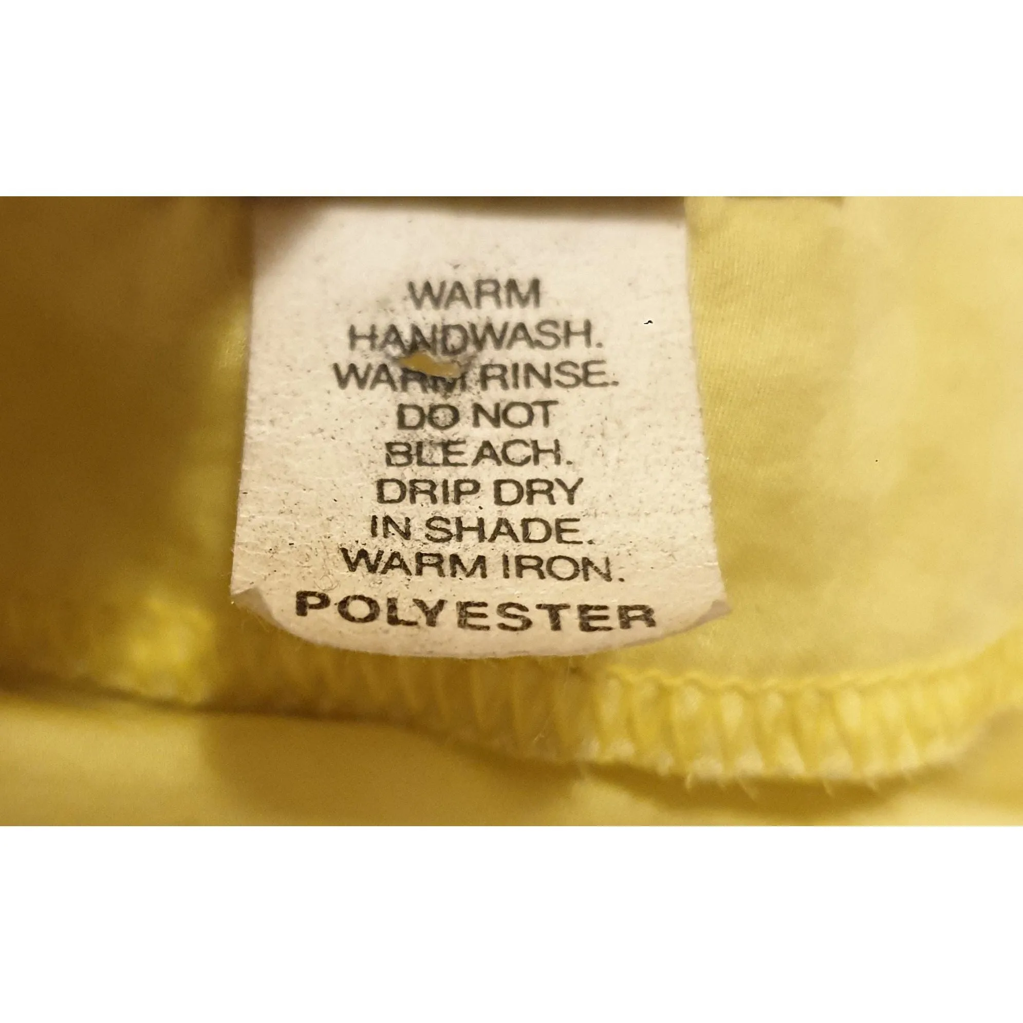 Queen yellow silky feel top with a pretty floral print detail size M (best fits size 12)
