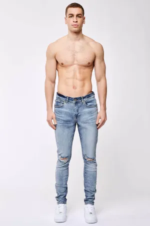 SKINNY FIT JEANS - LIGHT BLUE OVERDYE DESTROYED KNEE