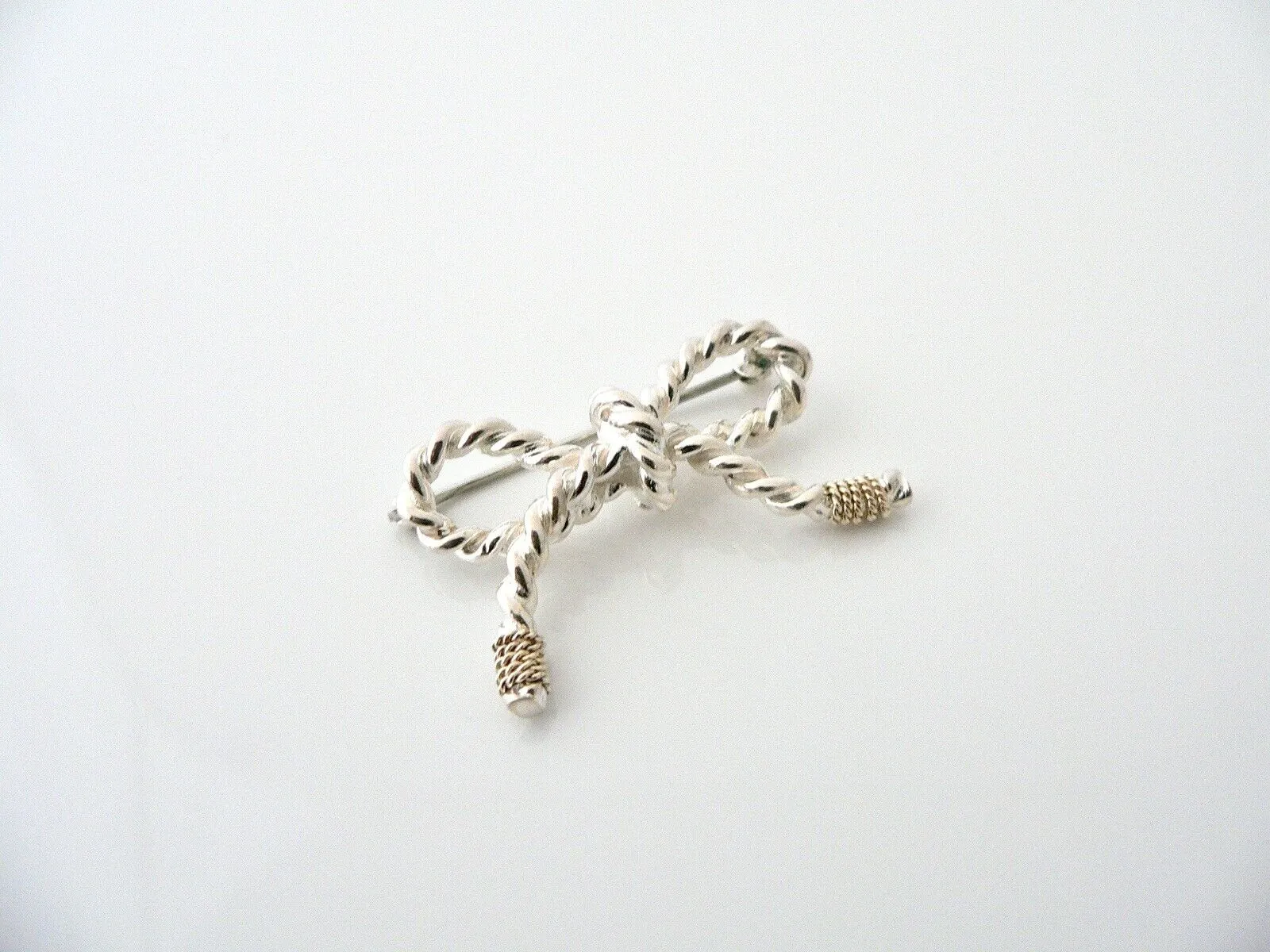 Tiffany & Co Ribbon Pin Textured Twisted Brooch Silver 14K Gold Love Gift Rare