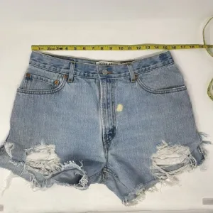Vintage Levi's Blue Regular Fit High Rise Frayed Hem Denim Shorts Size W36xL30