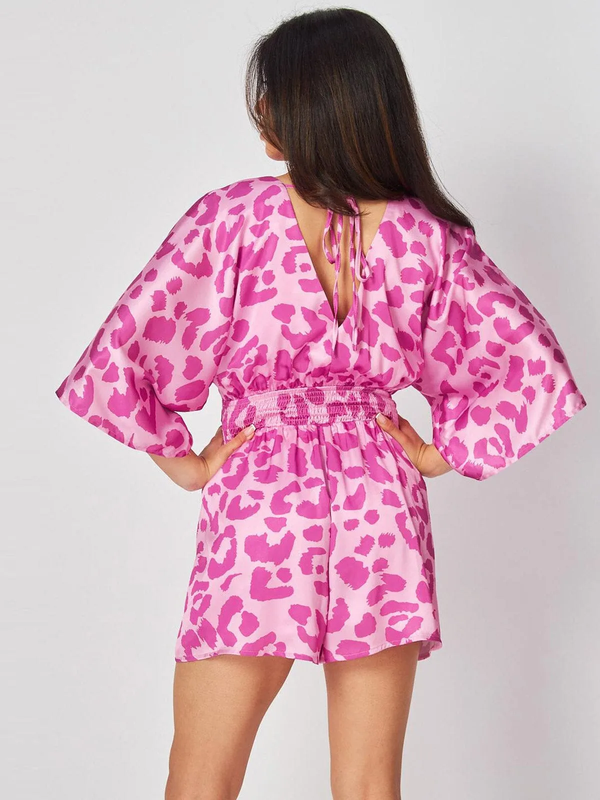 WOMEN'S SHORT SLEEVE SURPLICE FRONT POCKETS ANIMAL PRINT ROMPER