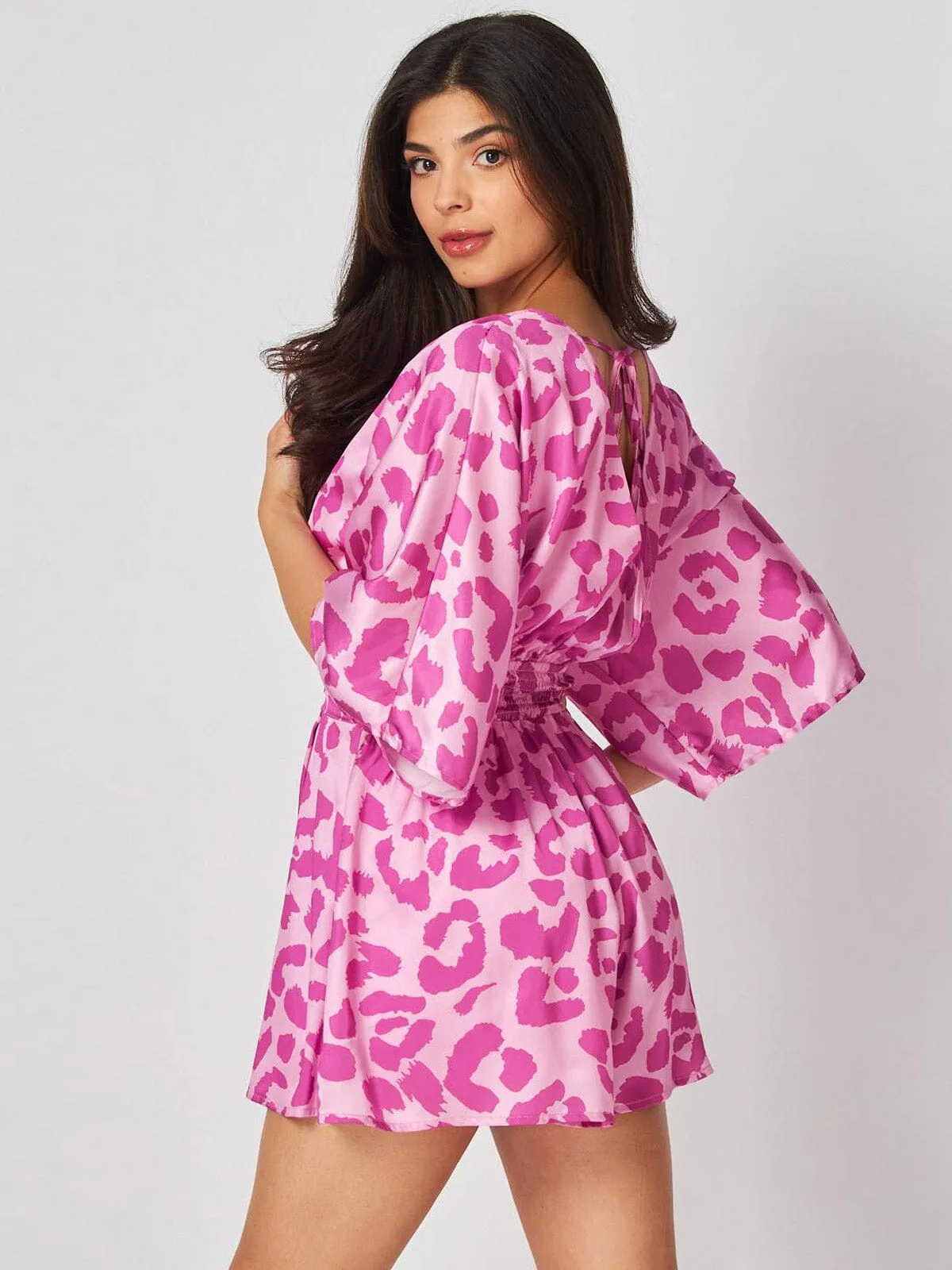 WOMEN'S SHORT SLEEVE SURPLICE FRONT POCKETS ANIMAL PRINT ROMPER
